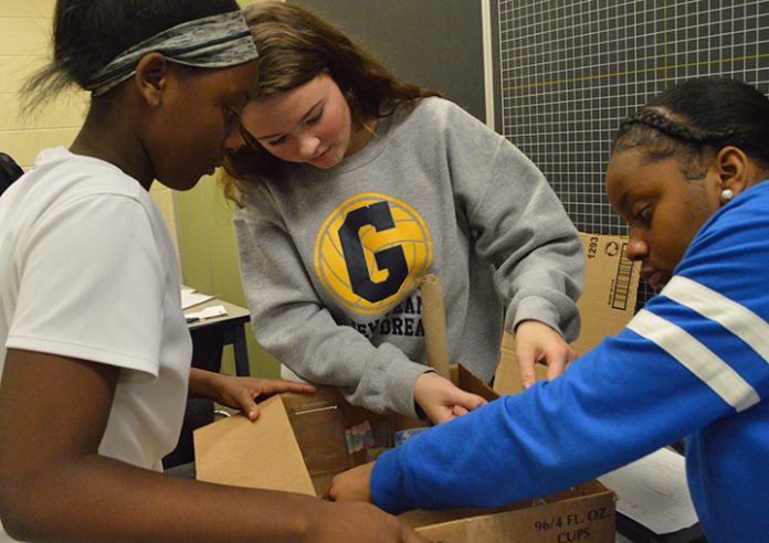 GW_design_thinking_1 From left, Diamond Johnson, Madisyn Rogers and Jamya Sanders work on their outdoor classroom prototype