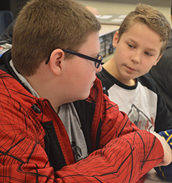 Quenton Gebben shares his thoughts while Gage Behrenbrinker listens