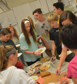 Teacher Lea Sevigny’s third-hour Natural Expressions class digs in to pancakes topped with locally sourced jellies and syrups