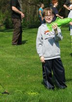 Fourth-grader Koen Unangst practices fly fishing with help from Schrems West Michigan Trout Unlimited