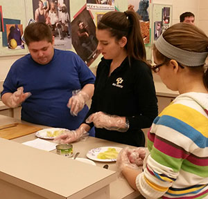 Emily Macalka volunteers with special education students at Comstock Park High School