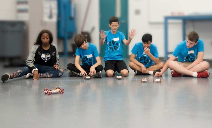 Koungo Diarrassouba, ninth grade, Aviation High School; Joshua Beuker, ninth grade, Grand Rapids homeschooler; Ty Dominic, seventh grade, Kenowa Hills Middle School; Steven Dang, ninth grade, Wyoming Junior High; and Harris Schumaker, ninth grade, Caledonia High School, built their mechanical race car and then built an electric race car later in the day